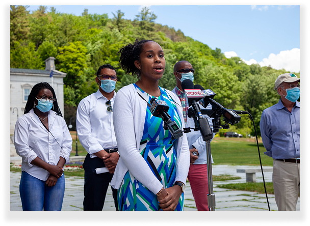 Xusana Davis speaking in front of the Vermont State House; Photo by Mike Dougherty/VTDigger